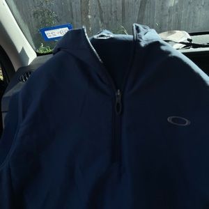 Blue Oakley vest with pockets